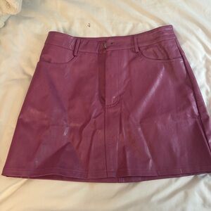 Pink leather mini skirt